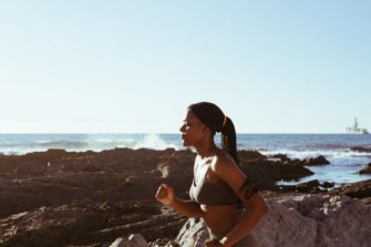 woman swtitches up her workout by running outdoors
