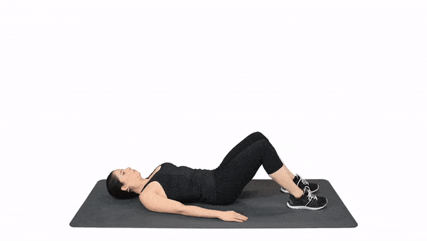 woman performing lower trunk rotation to help with back pain