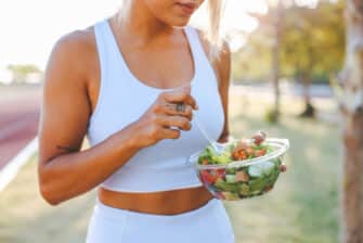 Woman eats a balanced diet after working out.