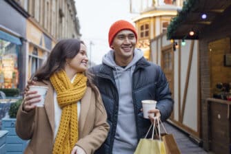 Couple enjoy holiday shopping for stress-free celebrations.