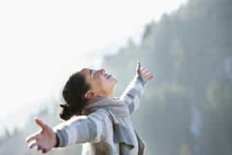 Women enjoys walk to improve emotional wellness and mental health.